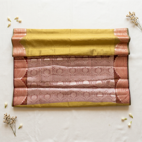 Background-focused saree photo edit on off-white linen