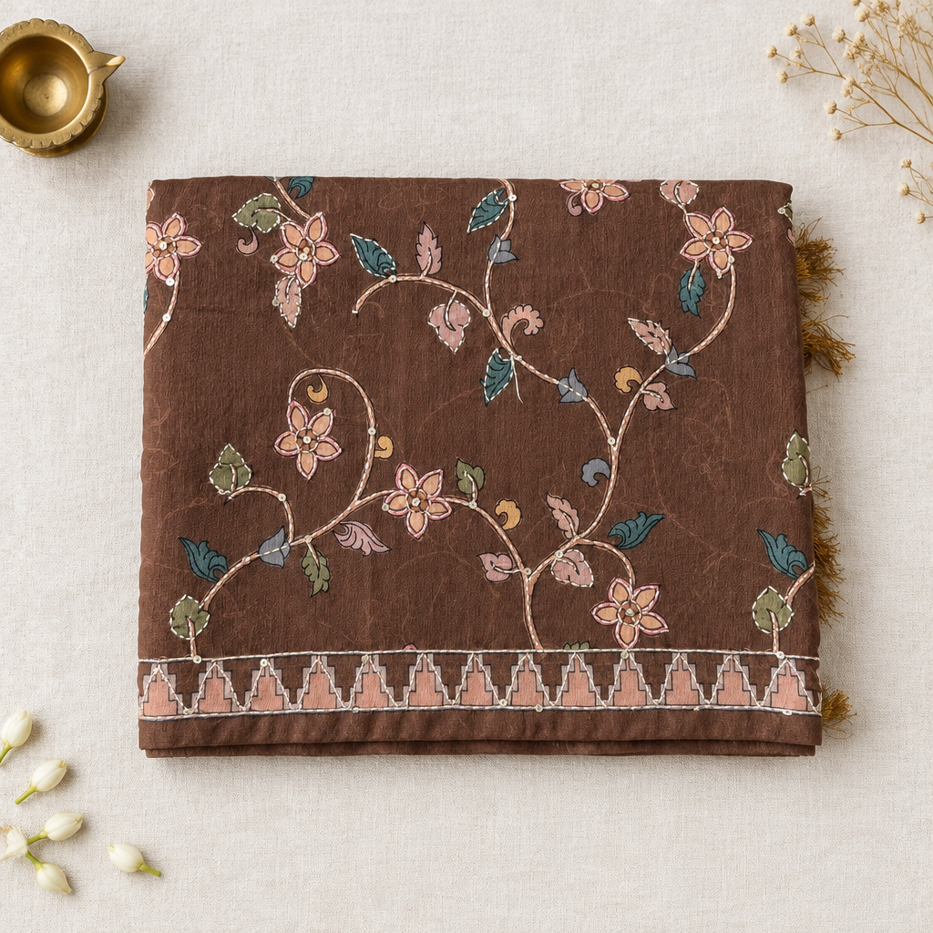 Folded brown saree on off-white linen