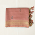 Folded saree background edit on off-white linen in a square composition
