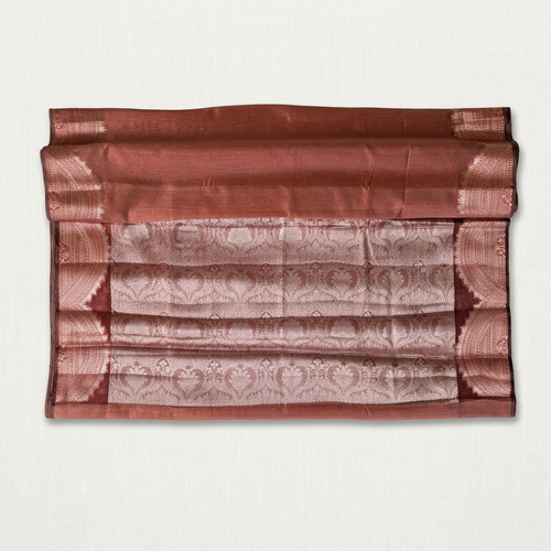 Open-pallu saree with an off-white linen background in a square composition