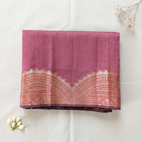 Saree on off-white linen with minimal floral accents